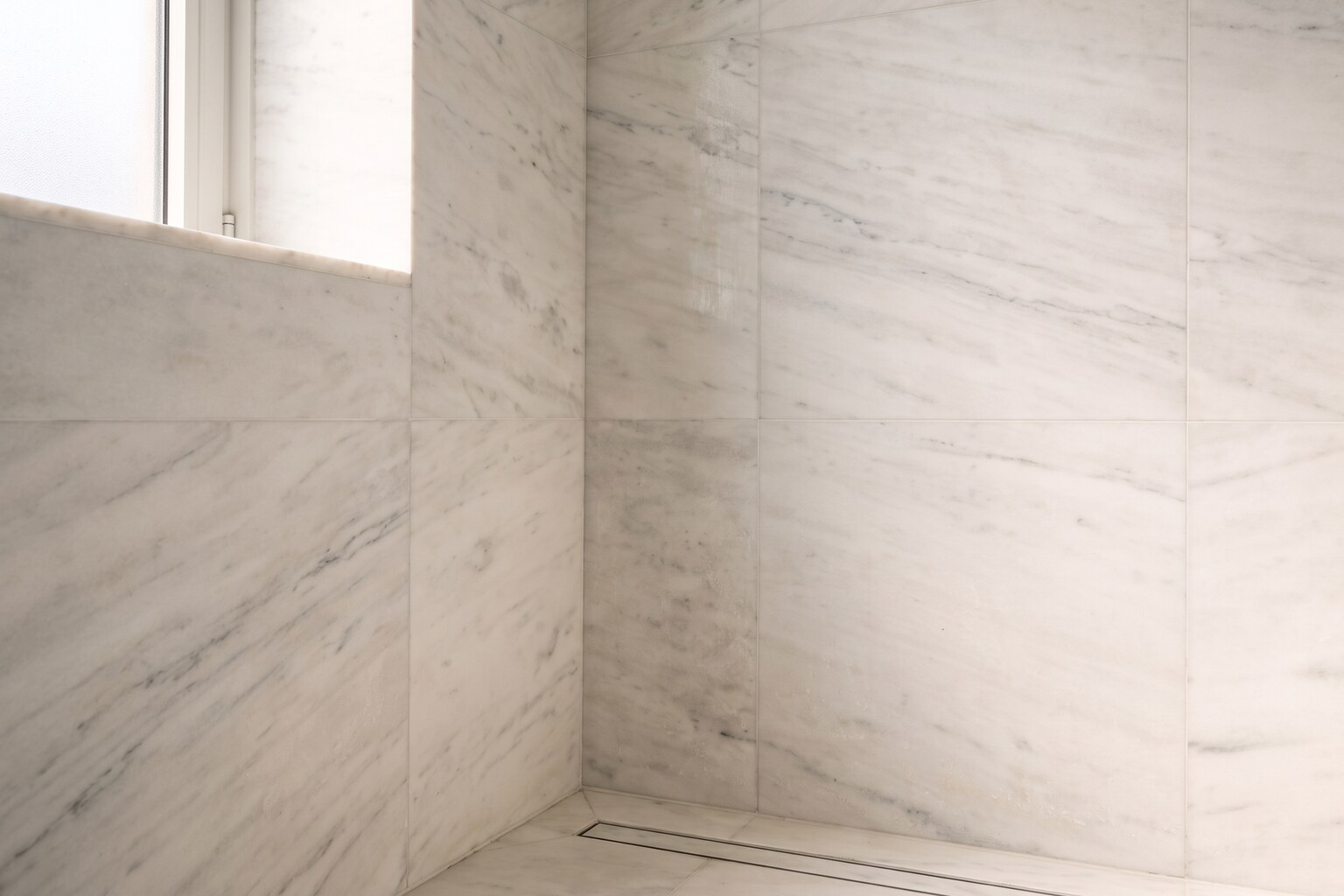 Soap scum and hard water buildup on marble tile can be cleaned safely with the right methods.