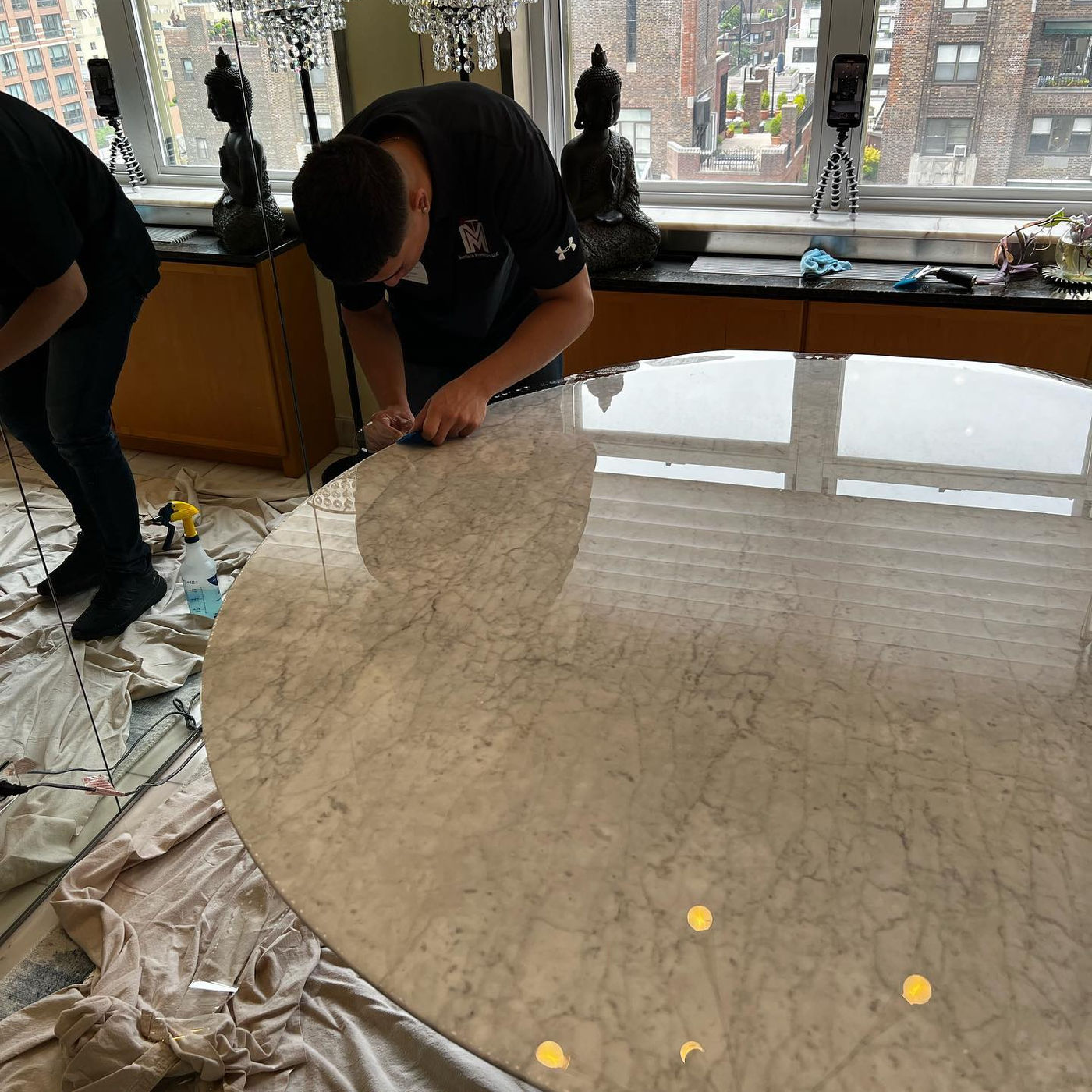 Polished marble dining table, gleaming. White Marble with StoneGuard Clear film in Tribeca, NY